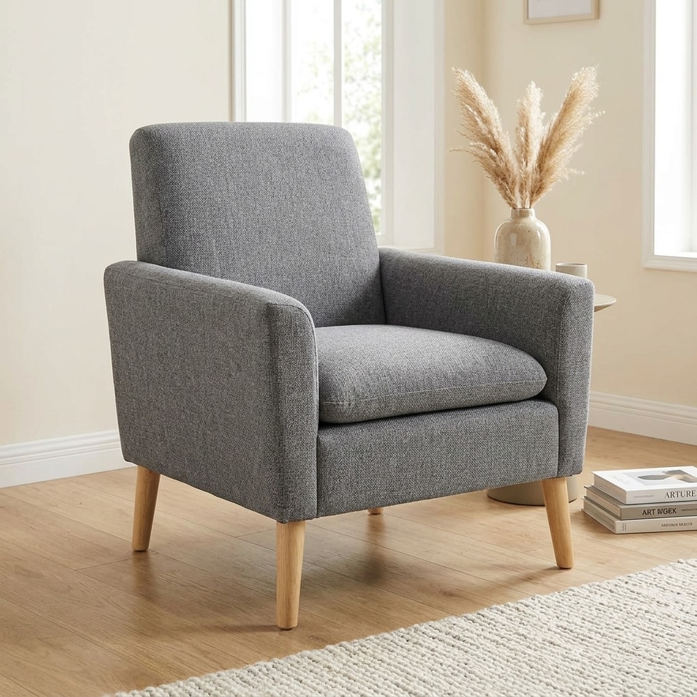 Sillón tapizado gris con patas de madera