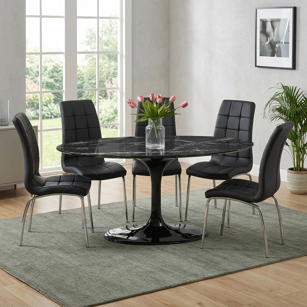Mesa de comedor ovalada de mármol negro