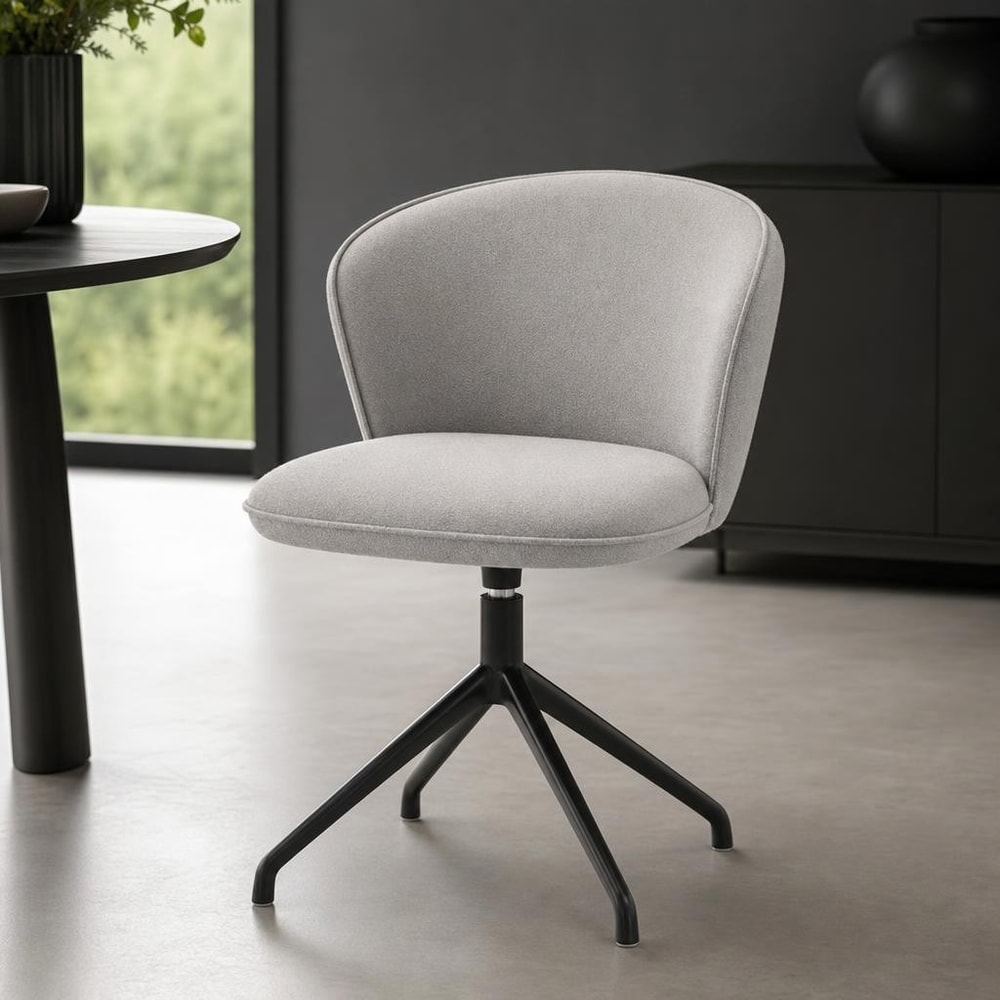 Silla de comedor gris con pata araña negra