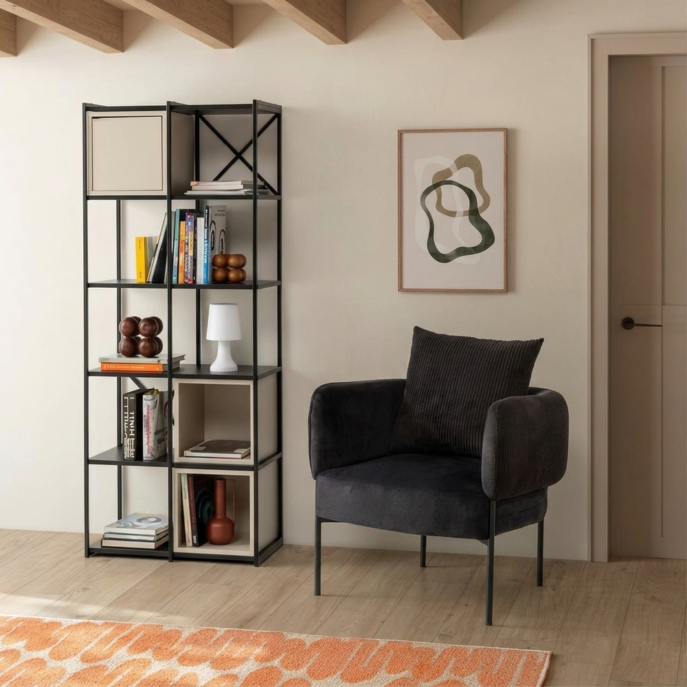 Sillón moderno de pana negra con patas metálicas
