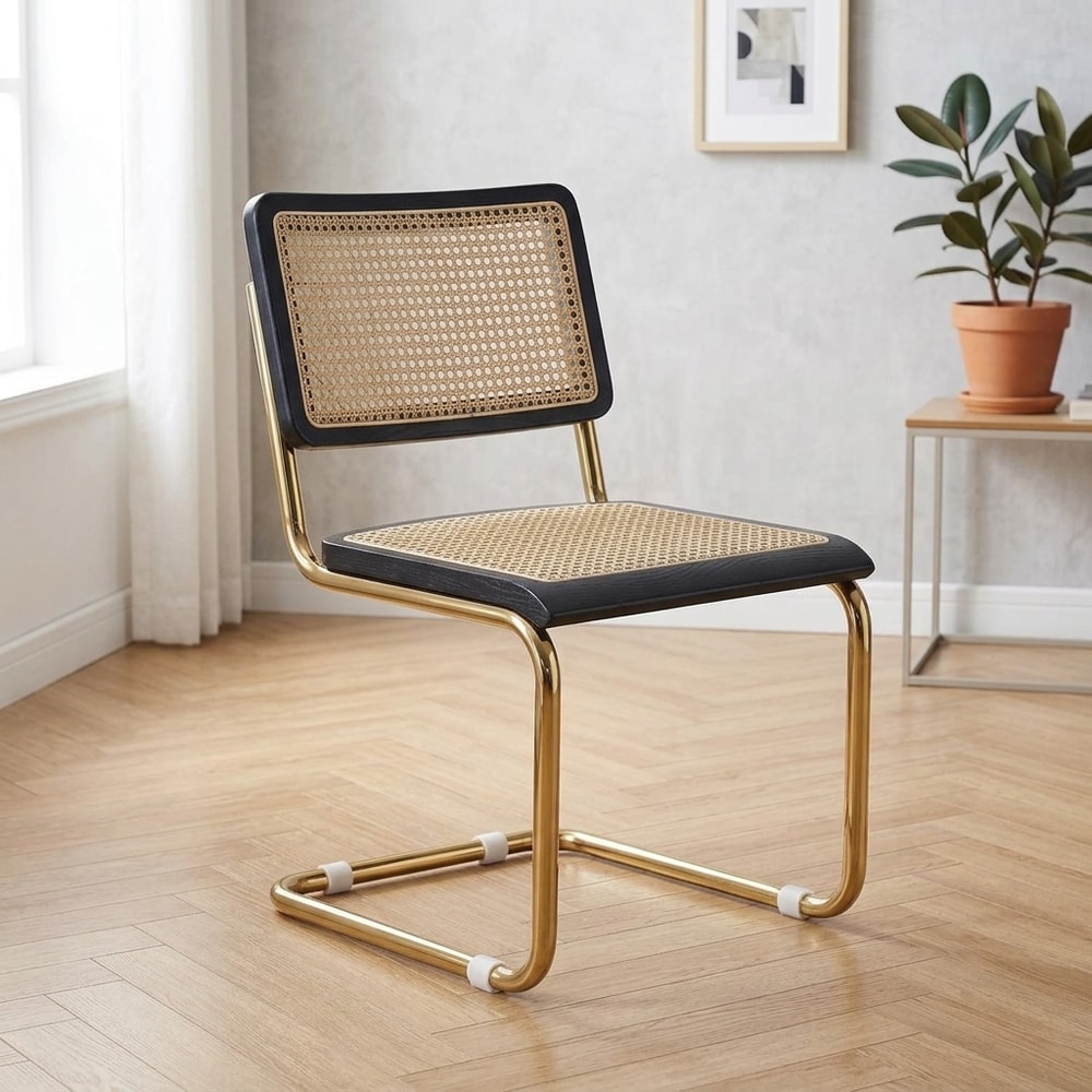 Silla de comedor negra con ratán y metal dorado