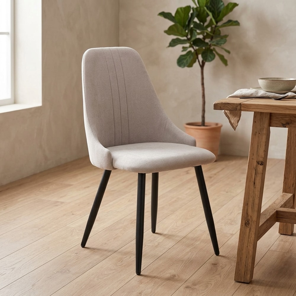 Silla de comedor tapizada gris con patas negras