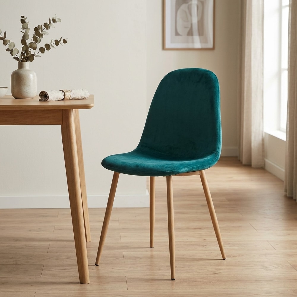 Silla de comedor tapizada en terciopelo verde