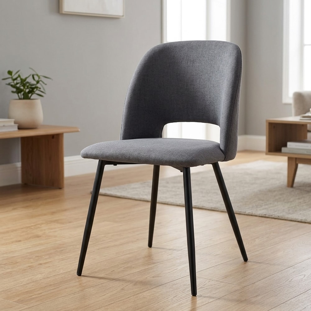 Silla de comedor tapizada gris con patas negras