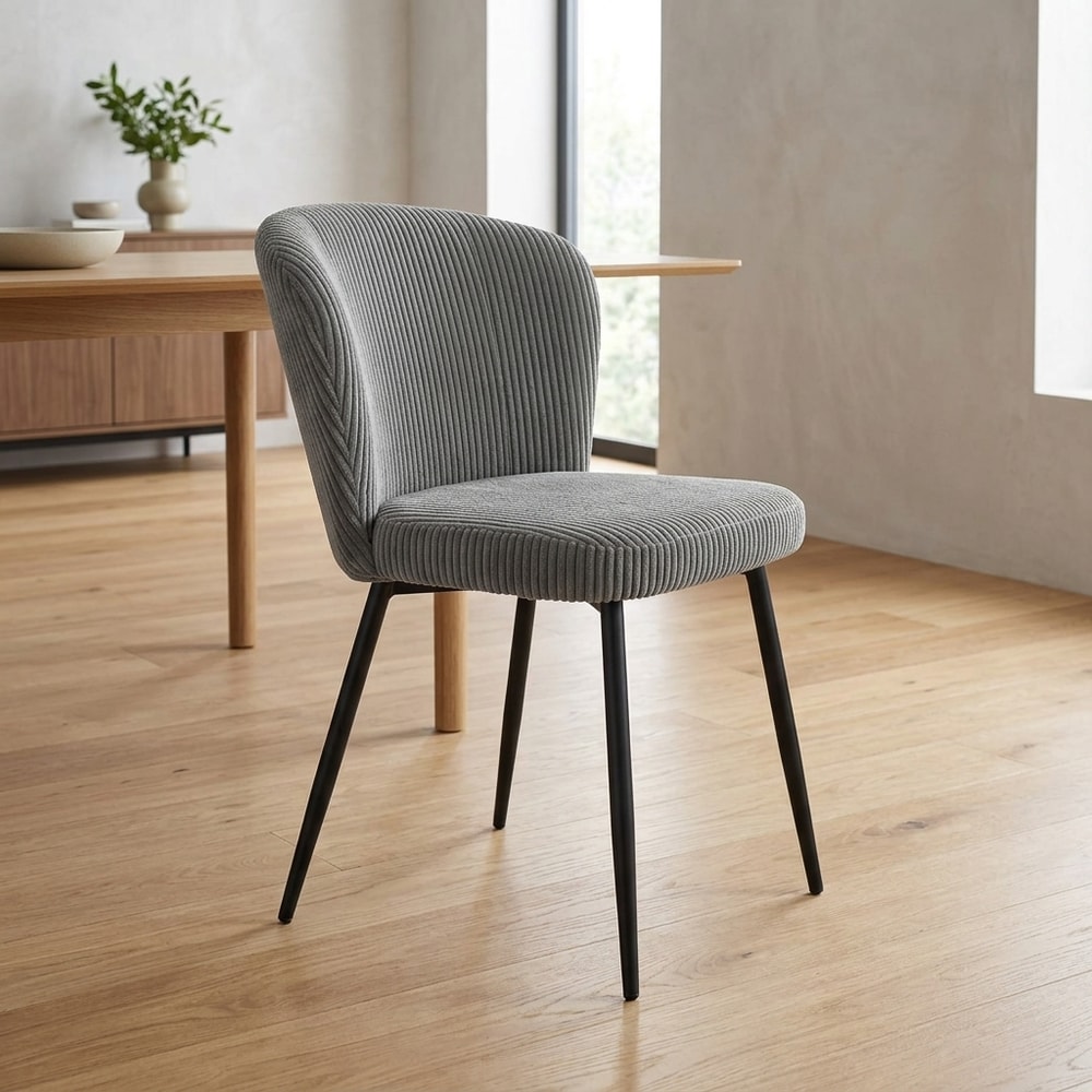 Silla de comedor tapizada gris con patas negras