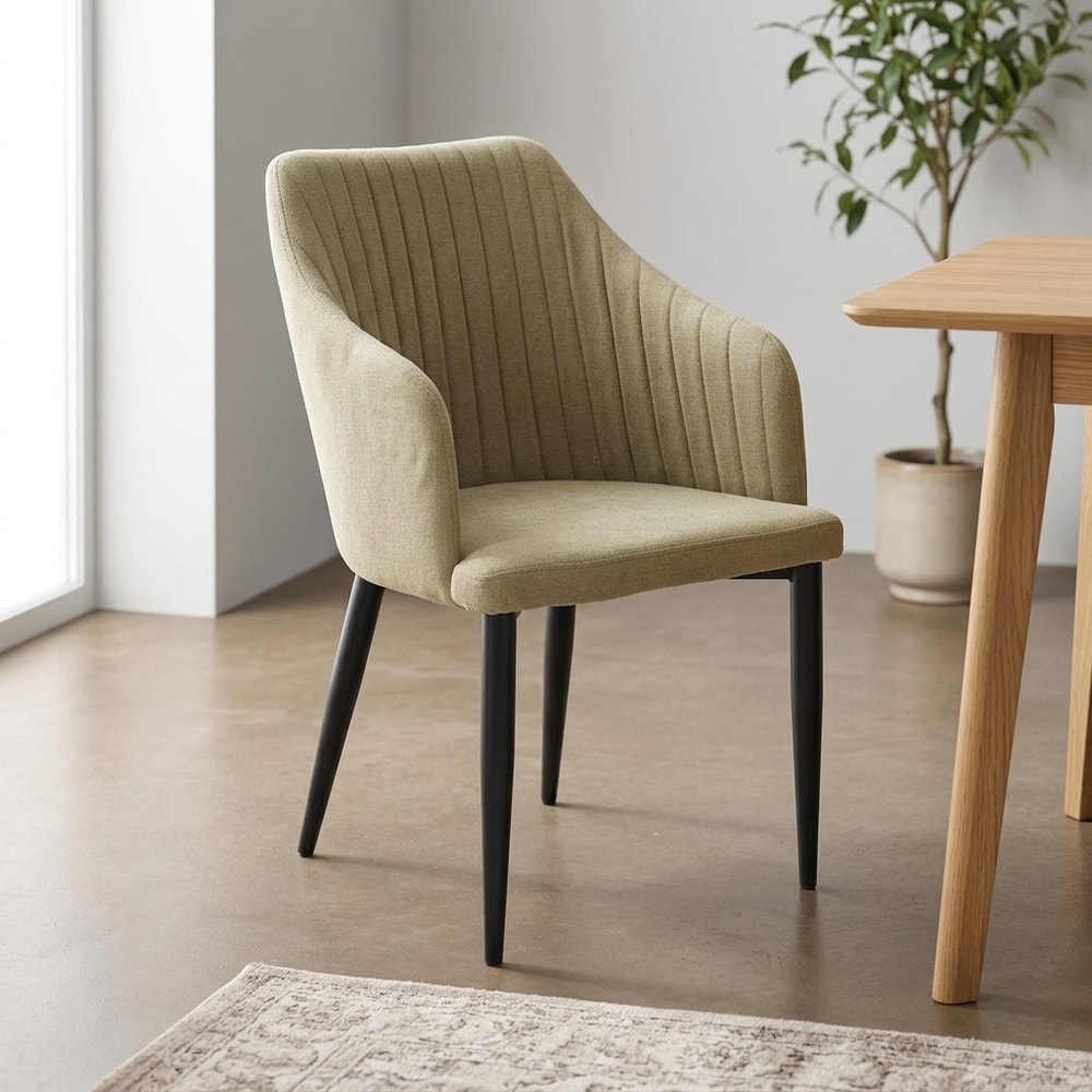 Sillón elegante verde con patas metálicas negras
