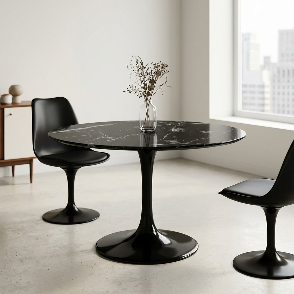 Mesa de comedor redonda de mármol negro
