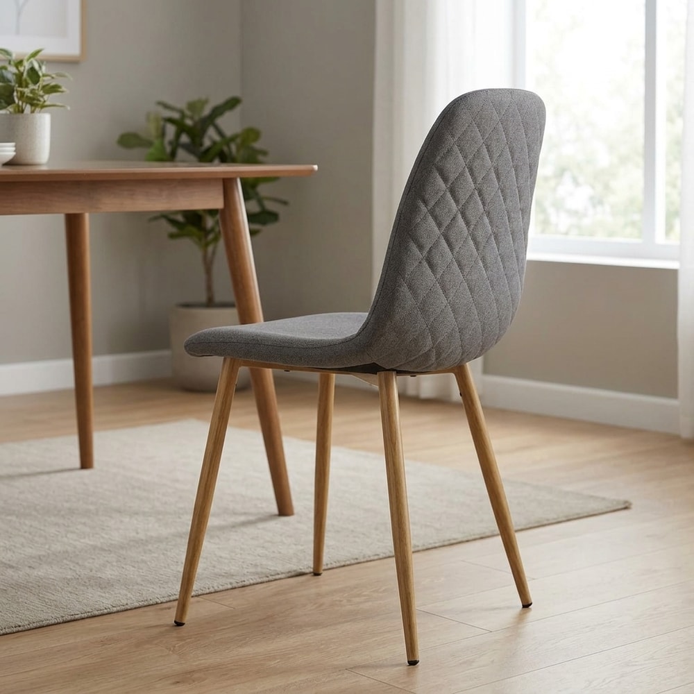 Silla de comedor tapizada gris capitoné