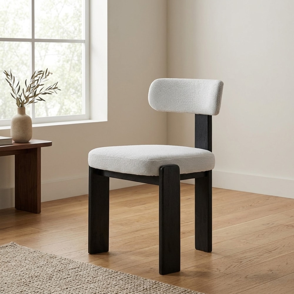 Silla de comedor tapizada gris con patas negras