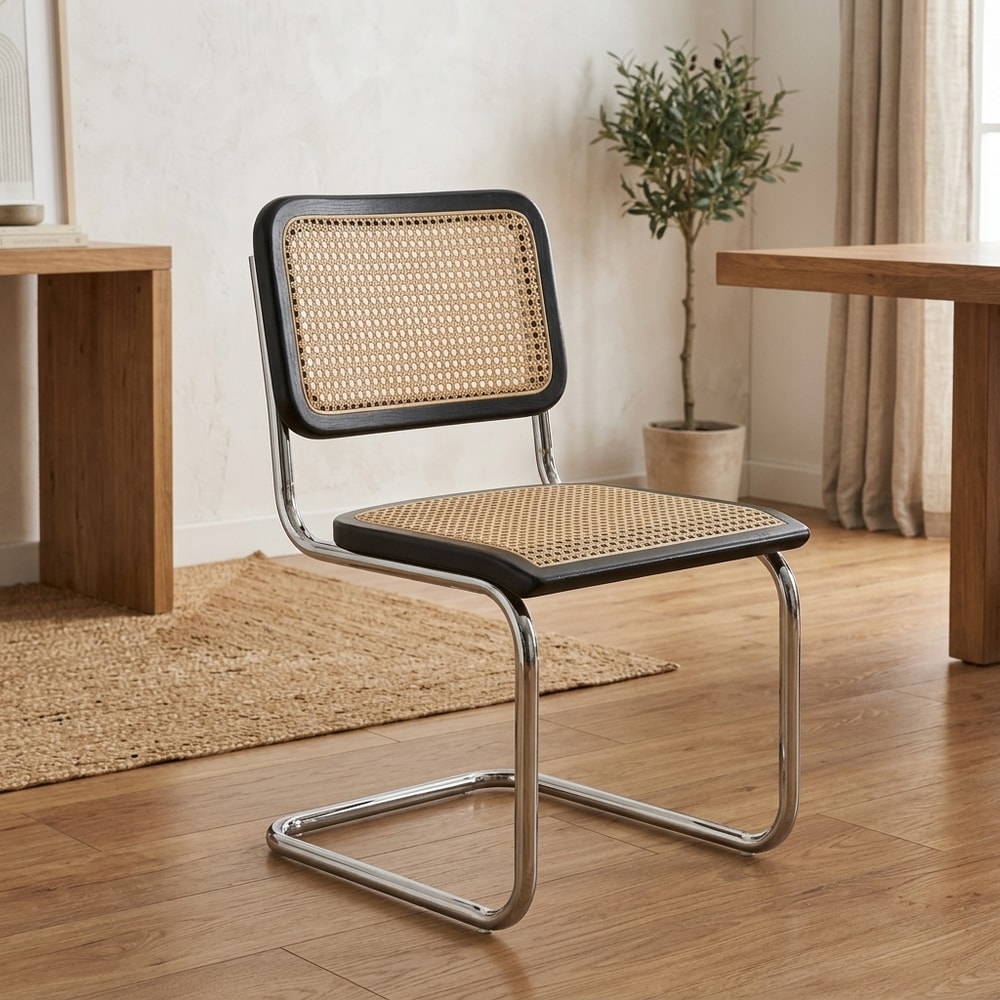 Silla de comedor negra con ratán y acero cromado